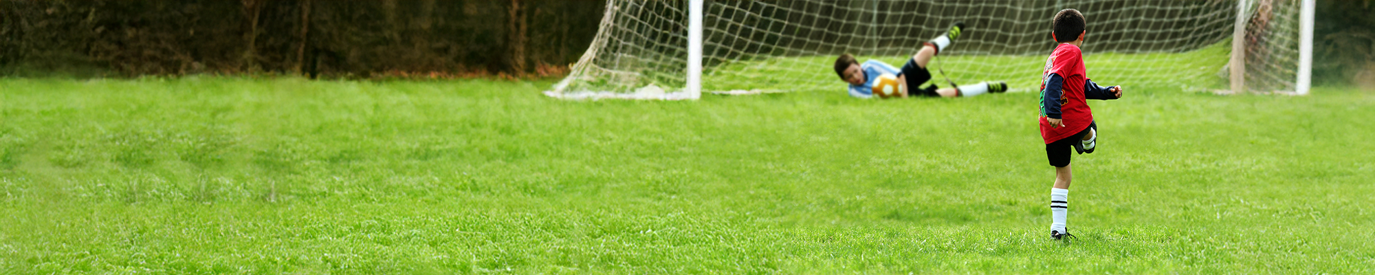 Children playing soccer