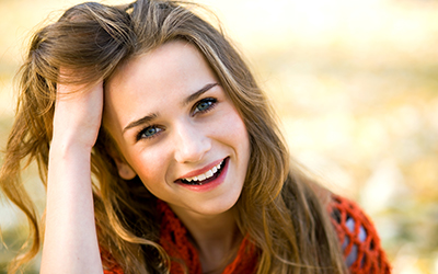 Young teenage girl smiling