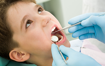 Young boy having dental work done