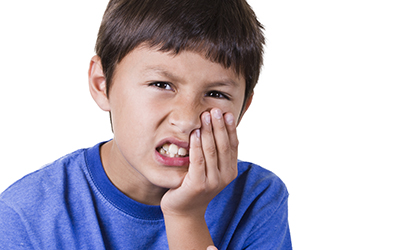 Young boy with a toothache