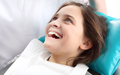 A young child in a dental chair